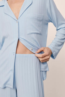Model is wearing Gisele TENCEL Modal Rib Long PJ Set in NantucketBreeze