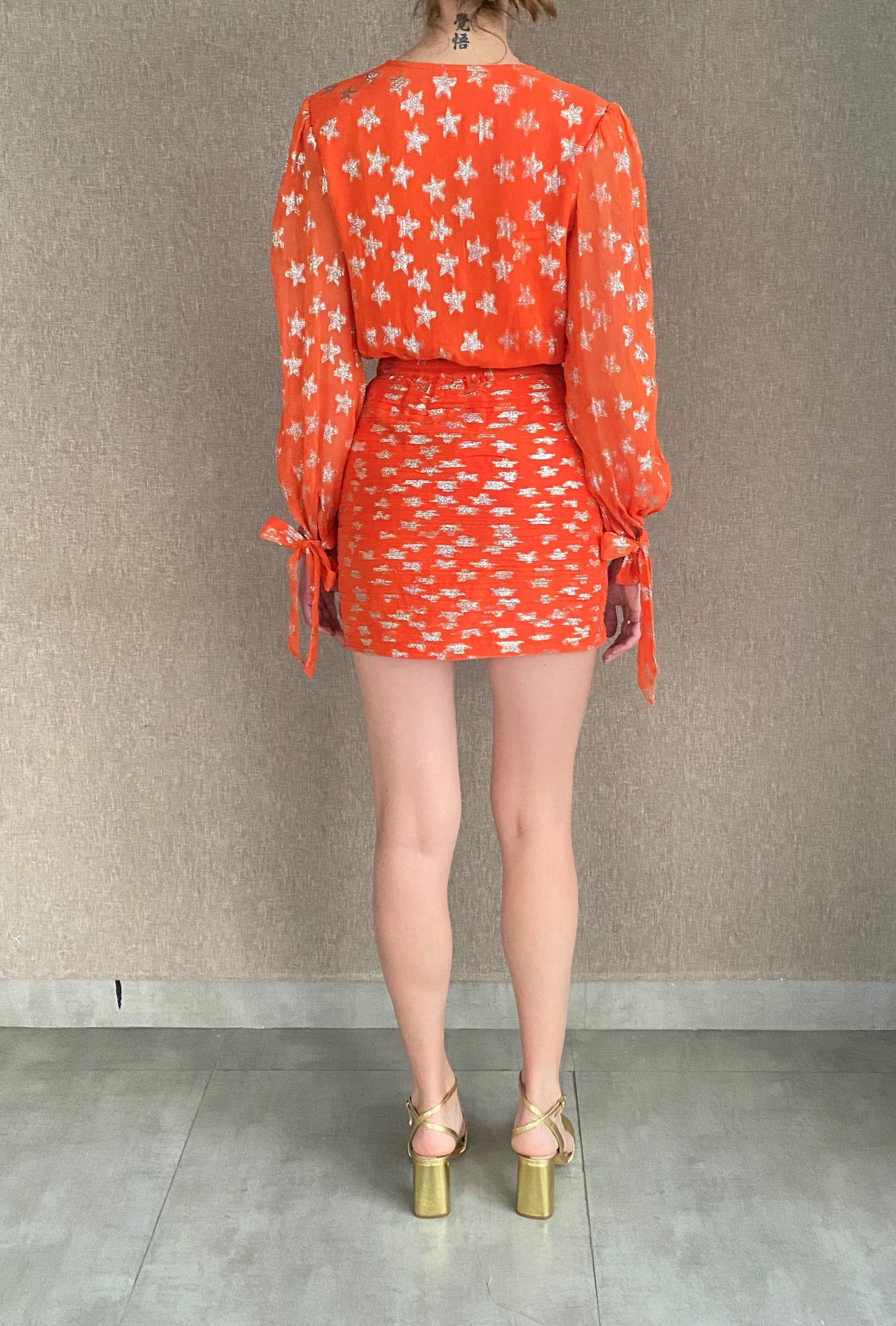 Rococo Sand | Vega Bodysuit | Orange