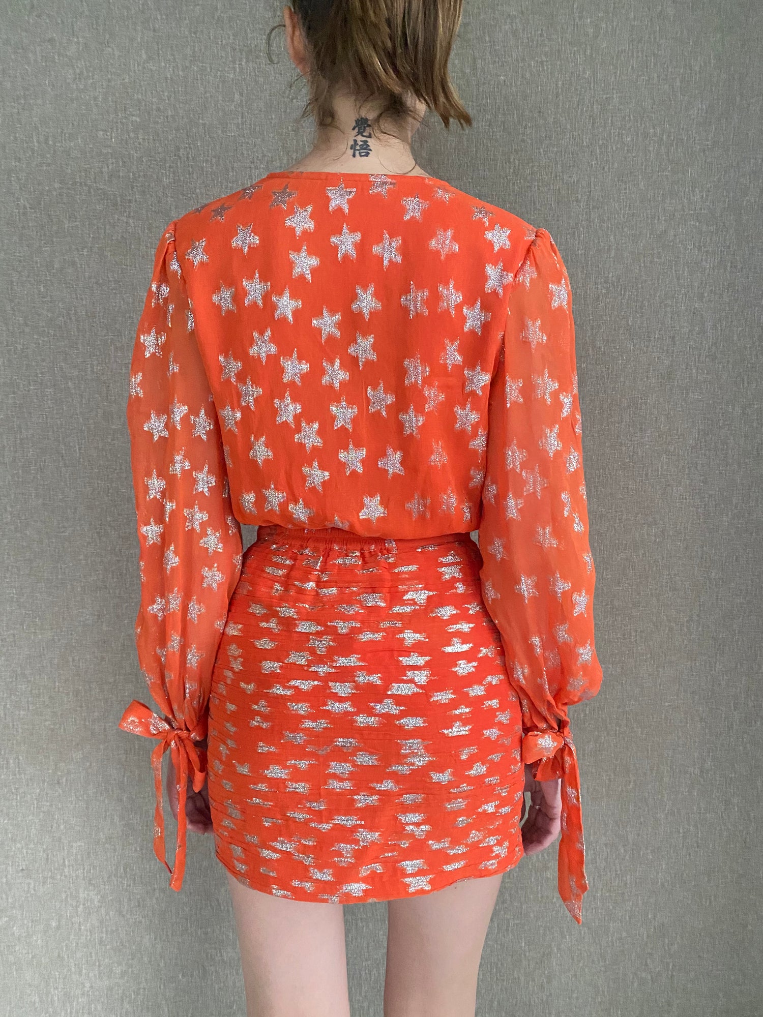 Rococo Sand | Vega Bodysuit | Orange
