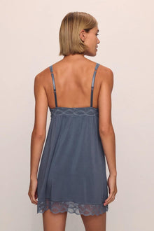 Model is wearing Georgina TENCEL Modal Slip in  Peppercorn