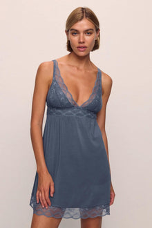 Model is wearing Georgina TENCEL Modal Slip in  Peppercorn