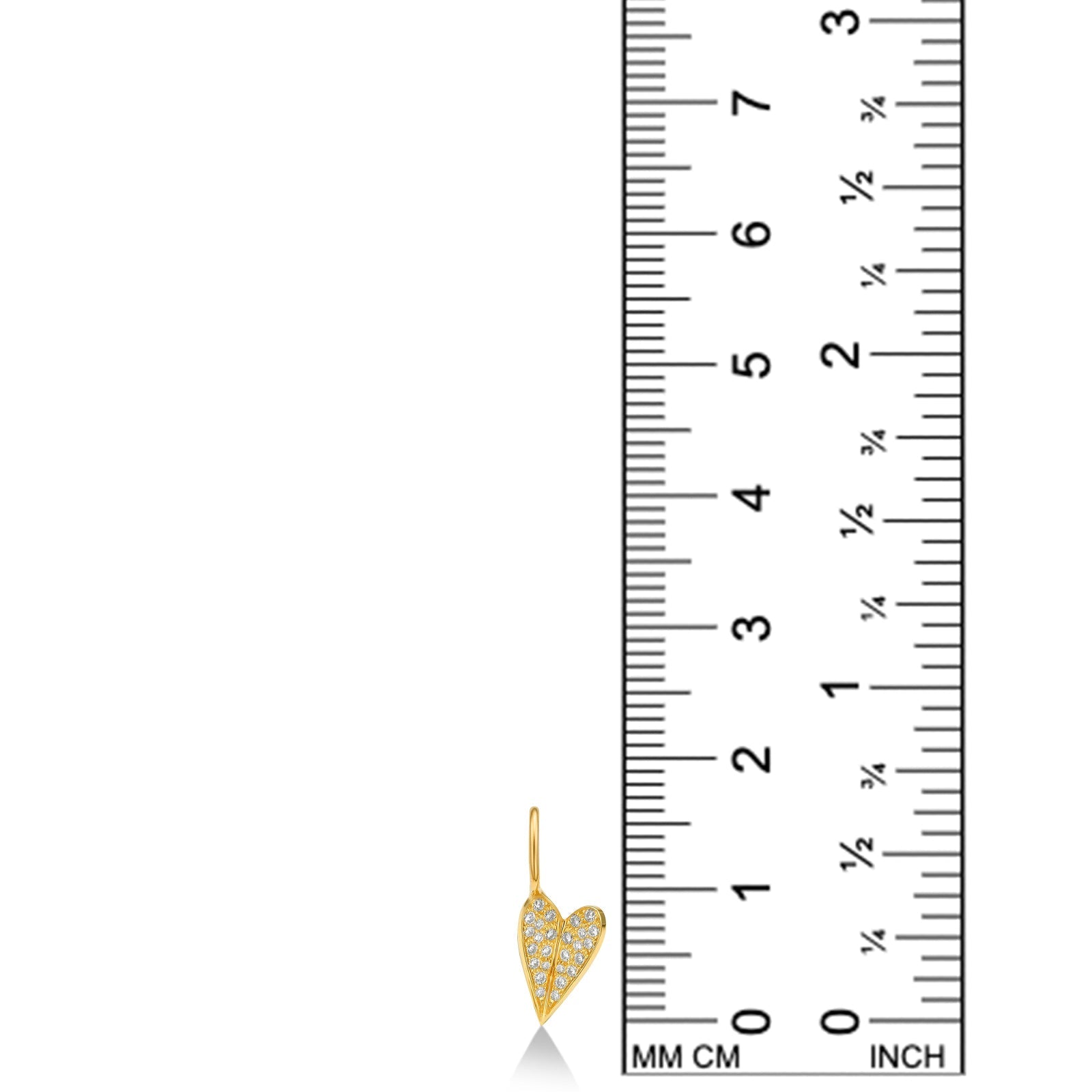 14K Small Folded Heart Charm with Diamond Pavé on both folded ends. On a white background with ruler. Measuring 16mm tall