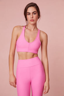 Light Support - Sports Bra with u shape neckline and crossed back straps.