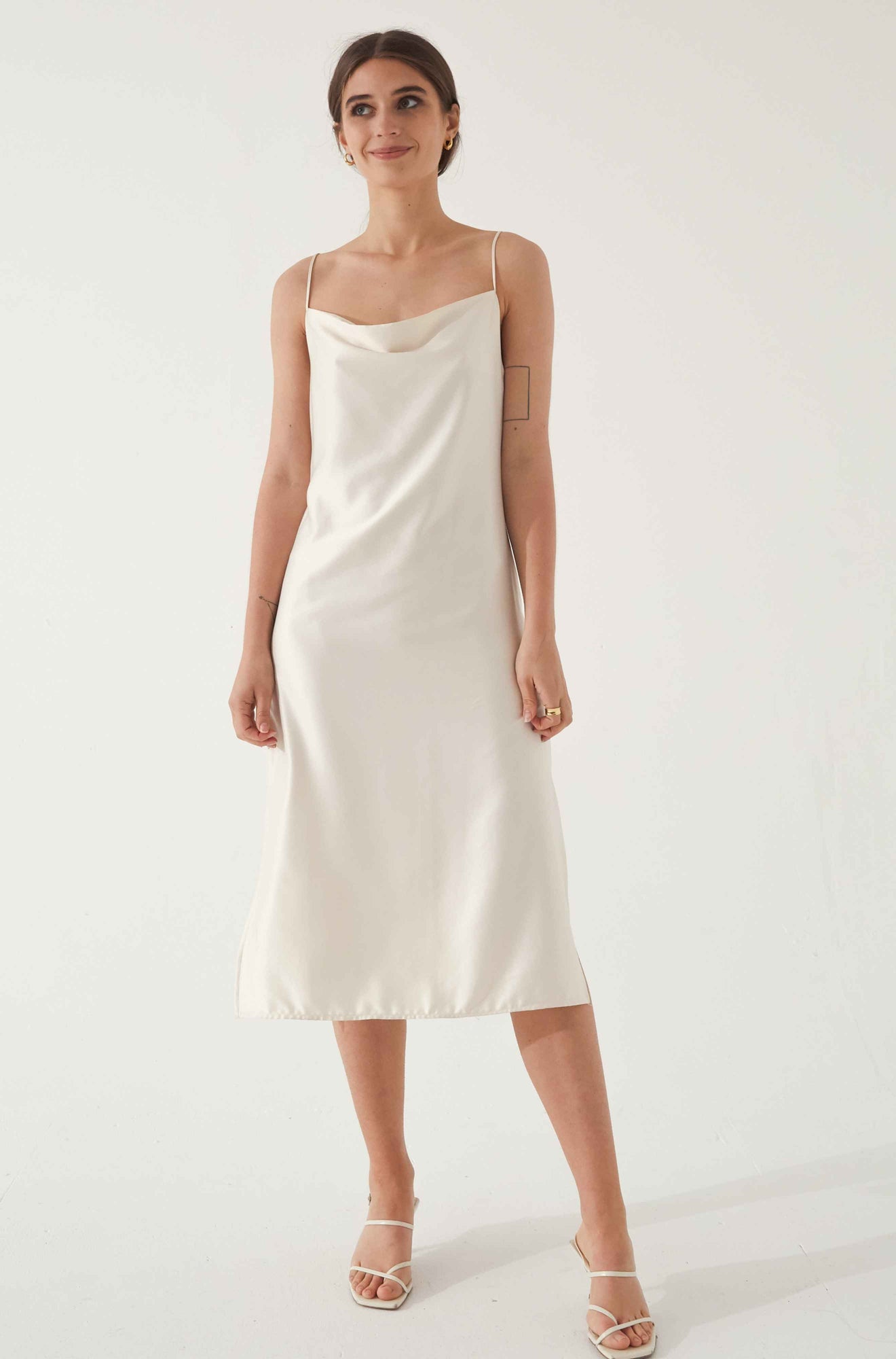 Woman wearing a white silk dress