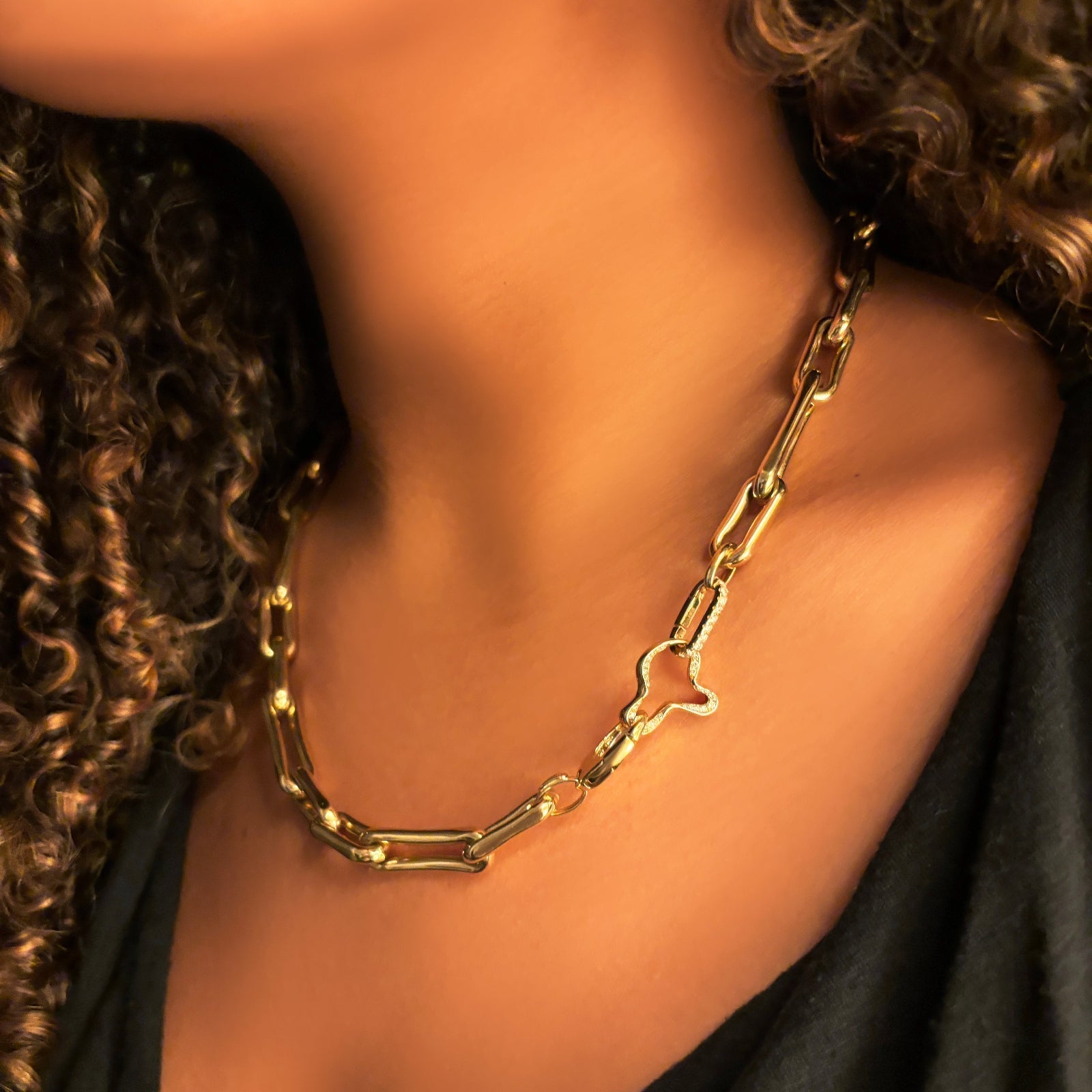 Ripple Charm with Diamond Pavé attached to the clasp of our Molten Link Chain Necklace, using a small diamond pavé charm lock.
