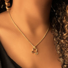 14k gold ripple charm on wheat chain