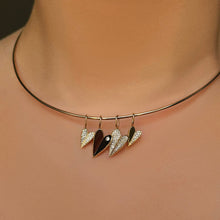 14k gold wire choker with four folded hearts with half, and full pavé. Cultured Diamonds