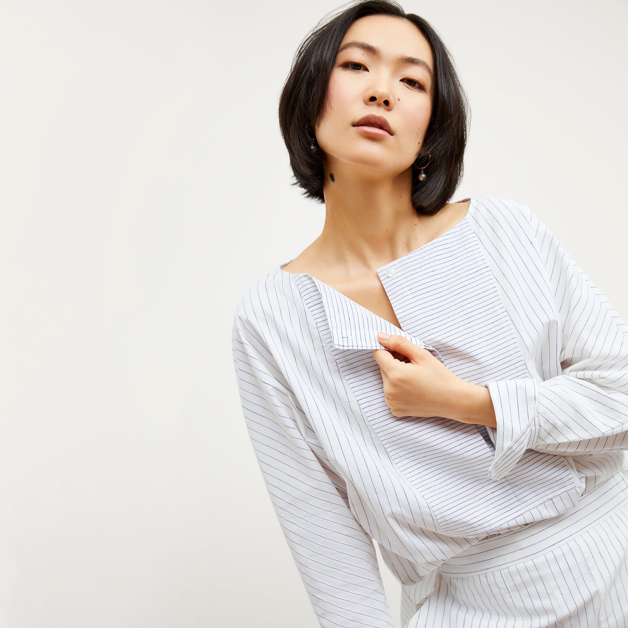 Image of a woman wearing the Chiara Top in Blue / Ivory