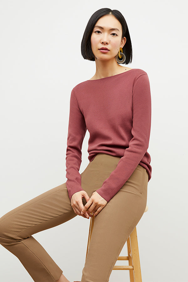 Front image of a woman sitting wearing the Foster Pant—Everstretch in Saddle | Exclude